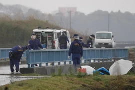 日本警方在犯罪现场进行调查（图片来源：越通社）