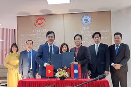 越南与老挝签署文书档案领域的合作谅解备忘录