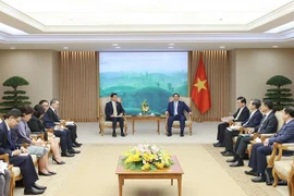 越南政府总理范明政会见泰国副总理兼外长班比·帕西塔努功