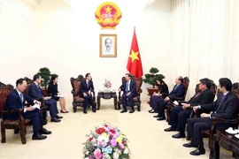 越南政府副总理黎明慨会见韩国国家农业合作社联合会主席