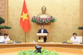 越南政府总理范明政主持4月政府例会