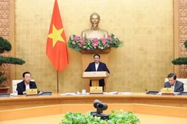 越南政府总理范明政主持召开2023年12月立法工作专题会议