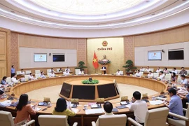 越南政府总理范明政：坚定不移攻坚克难完成既定目标任务