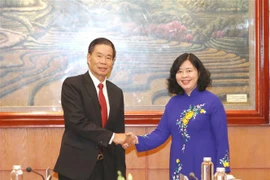 越南与老挝加强民运工作经验交流