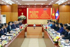 进一步加强越老两国内务部之间的交流与合作