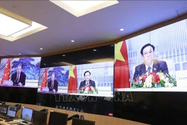 越南国会主席王廷惠与中国全国人大常委会委员长赵乐际举行视频会谈