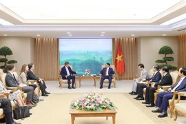 越南总理范明政会见美国总统气候问题特使约翰·克里