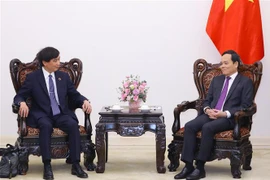 政府副总理陈流光会见万国邮政联盟总干事