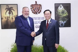 越南国会主席王廷惠会见古巴总理曼努埃尔·马雷罗·克鲁斯