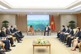 政府总理范明政会见世行驻越南首席代表