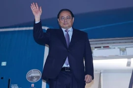 越南政府总理范明政启程对老挝进行正式访问