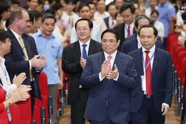 政府总理范明政：胡志明市国家大学等高等教育机构进一步发挥其在实施物色培训目标中的作用
