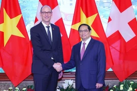 政府总理范明政会见瑞士联邦议会国民院议长
