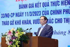越南政府总理范明政主持化解房地产市场困难和挑战的会议