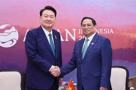  越南政府总理范明政会见韩国总统尹锡悦