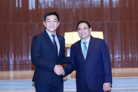  越南政府总理范明政会见新加坡国会议长陈川仁