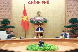 越南政府总理范明政主持召开 2 月政府例行会议