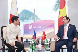 第42届东盟峰会：越南政府总理范明政会见菲律宾总统马科斯