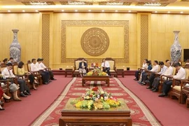 越南宁平省新闻机构与老挝《共产主义》杂志加强交流活动