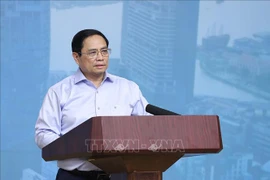 政府总理范明政：国家鼓励各经济成分按照市场机制发展社会保障性住房和工人住房
