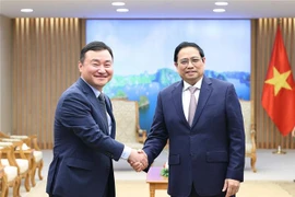 越南政府总理范明政会见三星电子公司总裁卢泰文