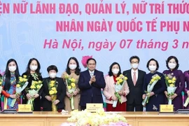 范明政总理：妇女对国家革新、融入国际社会与发展事业作出巨大贡献