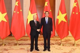 越共中央总书记阮富仲会见中国国务院总理李克强