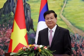 越老建交60周年：老挝人民革命党中央总书记、国家主席通伦呼吁两国人民继续保护和培育老越特殊关系