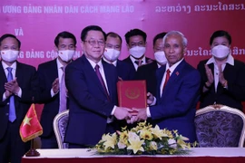 越南与老挝加强宣教领域的合作