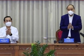 国家主席阮春福：全力以赴为对旭门和古芝两县投资促进会做准备