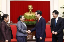 越共中央政治局委员、书记处常务书记武文赏会见老挝人民革命党中央组织部高级代表团一行