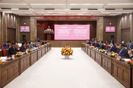 越南与老挝加强党建工作经验交流