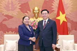 王廷惠会见老挝人民革命党中央组织部部长西赛•乐迪蒙颂一行