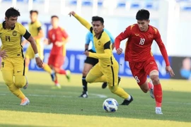 2022年亚洲U23足球锦标赛决赛阶段：越南队以2比0击败马来西亚队 挺进八强