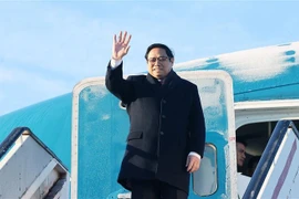 越南政府总理范明政抵达布鲁塞尔出席东盟-欧盟关系45周年纪念峰会并对比利时王国进行正式访问