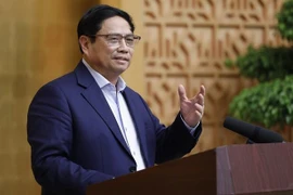 越南政府总理范明政：坚定不移保持宏观经济稳定 积极促进经济增长目标