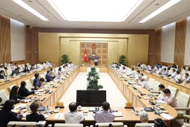 范明政就稳定宏观经济和抑制通胀率主持召开专家学者座谈会