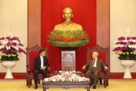 越共中央总书记阮富仲会见新加坡国会议长陈川仁