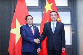 范明政总理会见中国国务院总理李克强