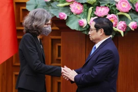 政府总理范明政会见任期届满前来辞行拜会的加拿大驻越大使