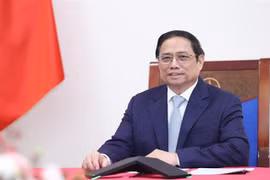 越南政府总理范明政与法国总理伊丽莎白·博尔内举行电话会谈