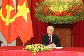 越共中央总书记阮富仲与德国社会民族党领导人、总理舒尔茨通电话