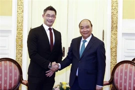 越南国家主席阮春福会见越南驻瑞士名誉领事菲利普·罗斯勒