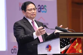 政府总理范明政出席第五次越美工商峰会并发表重要讲话