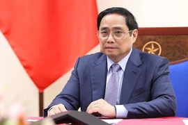 政府总理范明政同辉瑞首席执行官阿尔伯特·布尔拉通电话