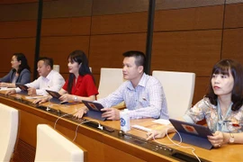 越南第十五届国会第三次会议：表决通过关于批准国家预算决算的决议