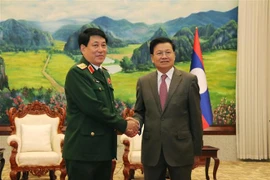 越老建交60周年：越南人民军总政治局主任率团访问老挝