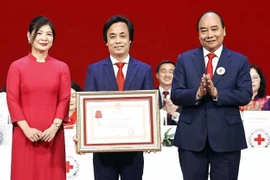 越南国家主席阮春福： 提高人道活动质量 传播人文价值