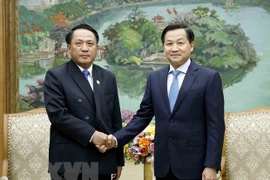 政府副总理黎明慨：老挝面临困难，越南愿意分担