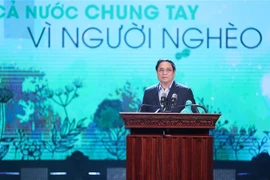 政府总理范明政：以实际行动携手扶贫